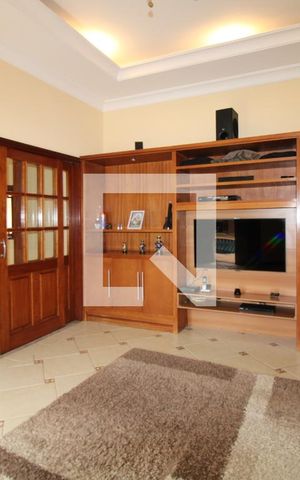 Casa à venda com 411m², 4 quartos e 5 vagasSala de TV