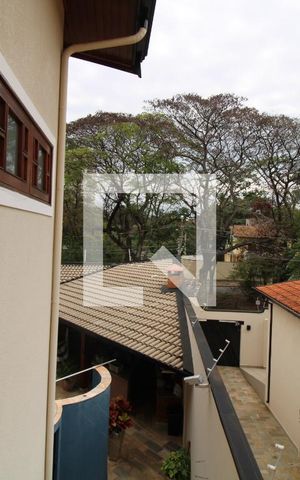 Casa à venda com 411m², 4 quartos e 5 vagasQuarto 2 (suíte) - Vista