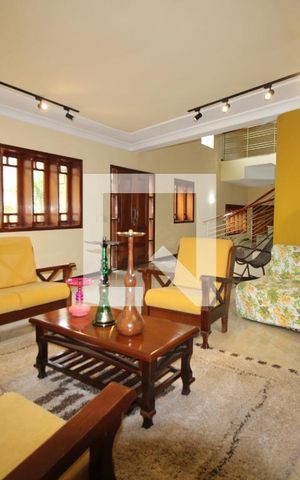 Casa à venda com 411m², 4 quartos e 5 vagasSala de estar