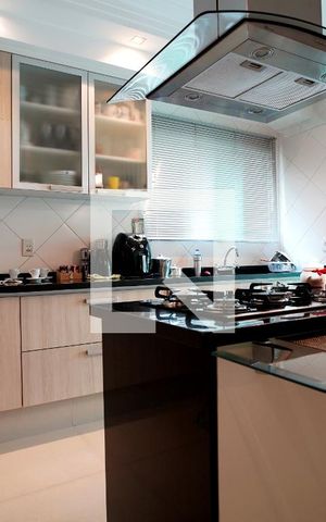Casa de condomínio para alugar com 300m², 3 quartos e 4 vagasCozinha