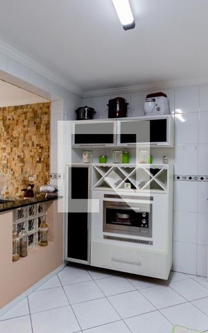 Casa à venda com 120m², 3 quartos e 2 vagas Casa à venda com 120m², 3 quartos e 2 vagasCozinha