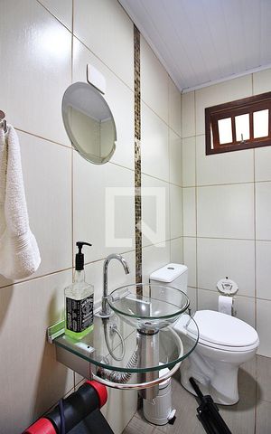Casa à venda com 212m², 3 quartos e 4 vagasBanheiro de Serviço