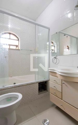 Casa à venda com 400m², 4 quartos e 4 vagasBanheiro Suíte 2