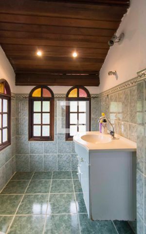 Casa à venda com 400m², 4 quartos e 4 vagasBanheiro Suíte 3