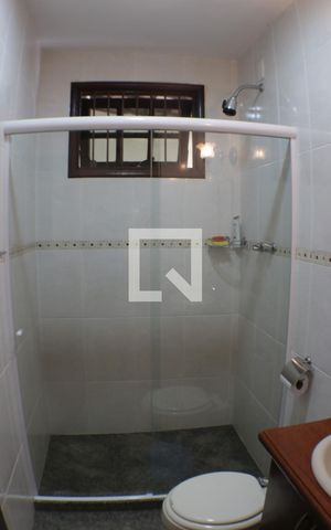Casa de condomínio à venda com 420m², 5 quartos e 4 vagasBanheiro do Quarto 5