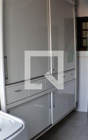 Casa de condomínio à venda com 420m², 5 quartos e 4 vagasÁrea de Serviço