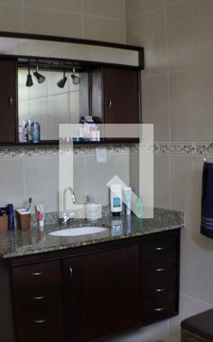Casa de condomínio à venda com 420m², 5 quartos e 4 vagasBanheiro do Quarto 4