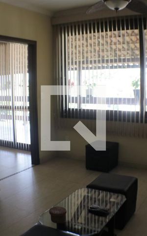 Casa de condomínio à venda com 420m², 5 quartos e 4 vagasSala de Estar