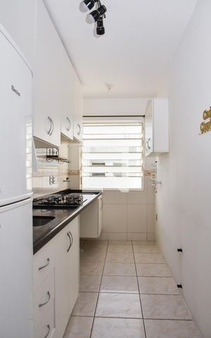 Apartamento à venda com 52m², 2 quartos e 1 vaga Apartamento à venda com 52m², 2 quartos e 1 vagaCozinha e Área de Serviço