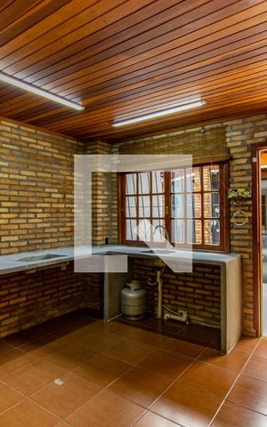Casa à venda com 164m², 4 quartos e 4 vagas Casa à venda com 164m², 4 quartos e 4 vagasCozinha