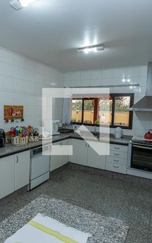 Casa de condomínio à venda com 450m², 4 quartos e 4 vagas Casa de condomínio à venda com 450m², 4 quartos e 4 vagasCozinha