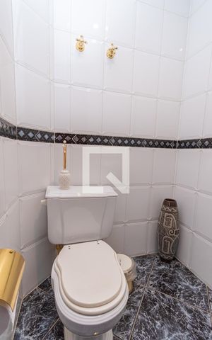 Casa de condomínio à venda com 450m², 4 quartos e 4 vagas Casa de condomínio à venda com 450m², 4 quartos e 4 vagasLavabo Sala