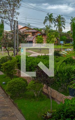 Casa de condomínio à venda com 450m², 4 quartos e 4 vagas Casa de condomínio à venda com 450m², 4 quartos e 4 vagasVista da Rua