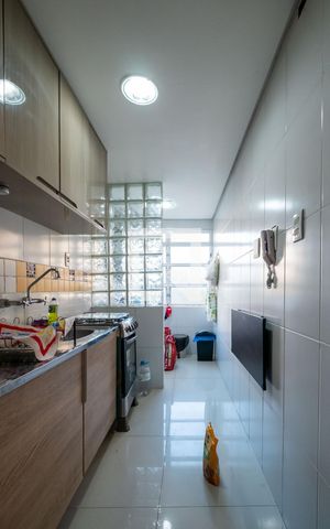 Apartamento à venda com 143m², 2 quartos e 2 vagas Apartamento à venda com 143m², 2 quartos e 2 vagasCozinha e Área de Serviço