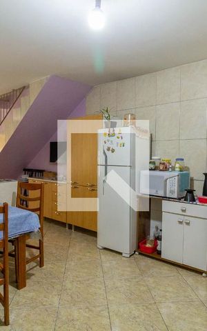 Casa à venda com 126m², 2 quartos e 2 vagas Casa à venda com 126m², 2 quartos e 2 vagasCozinha