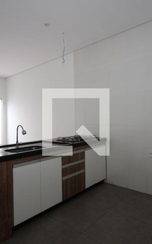 Casa de condomínio para alugar com 130m², 3 quartos e 2 vagasCozinha e Área de Serviço