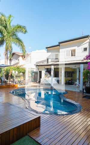 Casa de condomínio para alugar com 439m², 4 quartos e 4 vagas Casa de condomínio para alugar com 439m², 4 quartos e 4 vagasQuintal