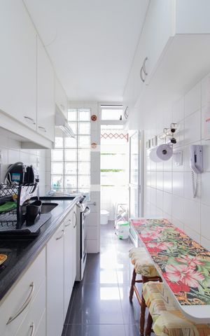 Apartamento à venda com 90m², 3 quartos e 1 vaga Apartamento à venda com 90m², 3 quartos e 1 vagaCozinha e Área de Serviço