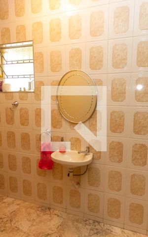 Casa à venda com 440m², 5 quartos e 8 vagas Casa à venda com 440m², 5 quartos e 8 vagasBanheiro da Garagem