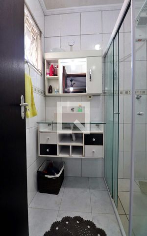 Casa à venda com 234m², 3 quartos e 3 vagasBanheiro do Quarto 1 - Suíte