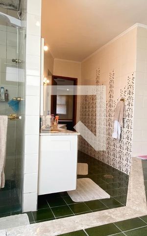 Casa de condomínio à venda com 340m², 3 quartos e 4 vagasBanheiro da Suíte 1