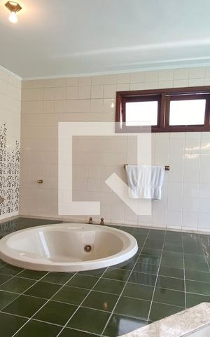 Casa de condomínio à venda com 340m², 3 quartos e 4 vagasBanheiro da Suíte 1