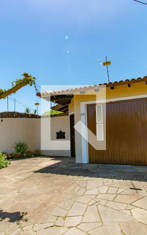 Casa à venda com 120m², 3 quartos e 3 vagas Casa à venda com 120m², 3 quartos e 3 vagasFachada