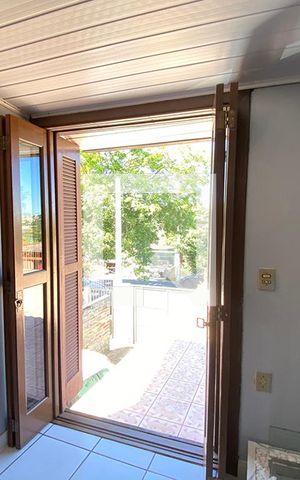 Casa à venda com 140m², 4 quartos e 2 vagasPorta Janela da Sala de Estar