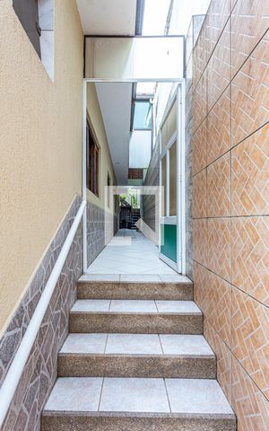 Casa à venda com 300m², 3 quartos e 2 vagas Casa à venda com 300m², 3 quartos e 2 vagasEscada Garagem / Entrada Casa
