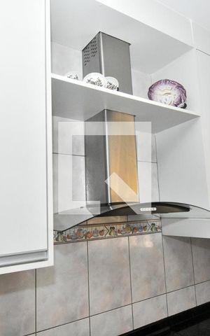 Casa à venda com 170m², 3 quartos e 2 vagas Casa à venda com 170m², 3 quartos e 2 vagasCozinha - Armários
