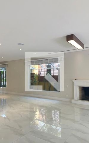 Casa de condomínio à venda com 450m², 4 quartos e 4 vagasSala