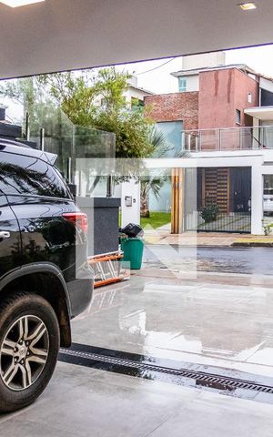 Casa de condomínio à venda com 550m², 6 quartos e 4 vagas Casa de condomínio à venda com 550m², 6 quartos e 4 vagasGaragem