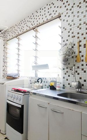 Apartamento à venda com 80m², 3 quartos e 1 vaga Apartamento à venda com 80m², 3 quartos e 1 vagaCozinha e Área de Serviço