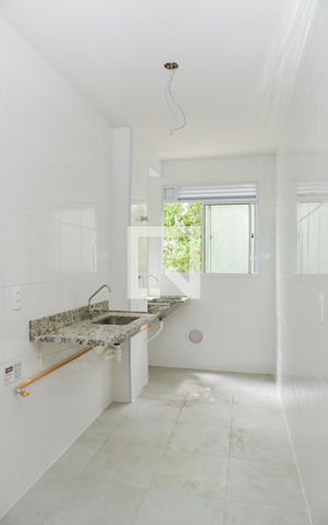 Apartamento à venda com 45m², 2 quartos e sem vaga Apartamento à venda com 45m², 2 quartos e sem vagaCozinha e Área de Serviço