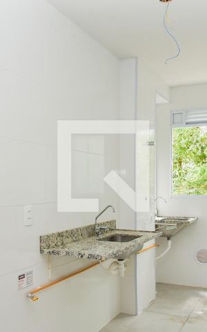 Apartamento à venda com 45m², 2 quartos e sem vaga Apartamento à venda com 45m², 2 quartos e sem vagaCozinha e Área de Serviço