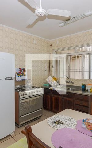 Casa à venda com 215m², 3 quartos e 3 vagas Casa à venda com 215m², 3 quartos e 3 vagasCozinha