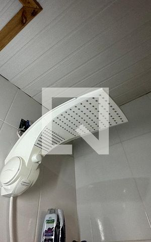 Casa à venda com 120m², 3 quartos e 4 vagasChuveiro do Banheiro da Suíte