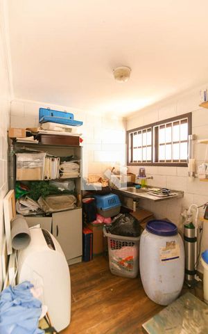 Casa à venda com 500m², 5 quartos e 5 vagas Casa à venda com 500m², 5 quartos e 5 vagasEscritório