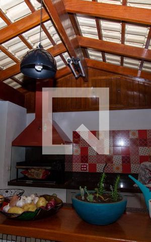 Casa de condomínio à venda com 199m², 4 quartos e 4 vagas Casa de condomínio à venda com 199m², 4 quartos e 4 vagasÁrea comum - Churrasqueira