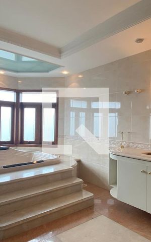 Casa de condomínio à venda com 954m², 4 quartos e 8 vagasBanheiro da Suíte 1