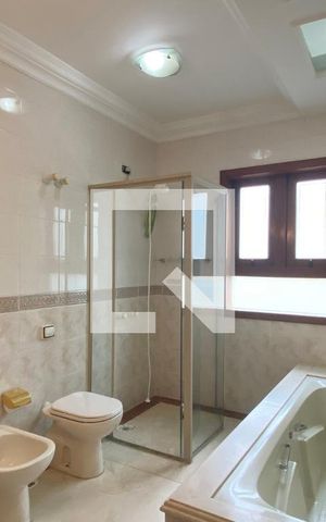 Casa de condomínio à venda com 954m², 4 quartos e 8 vagasBanheiro da Suíte 4