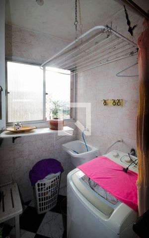 Apartamento à venda com 57m², 2 quartos e 1 vaga Apartamento à venda com 57m², 2 quartos e 1 vagaCozinha e Área de Serviço