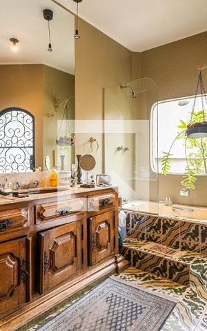 Casa à venda com 440m², 5 quartos e 2 vagasBanheiro da Suíte
