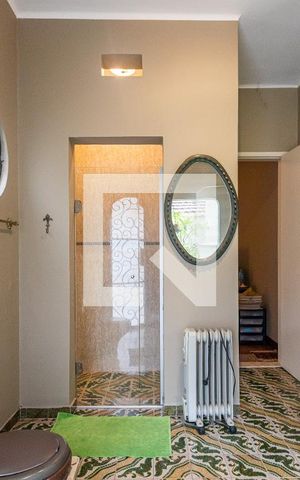 Casa à venda com 440m², 5 quartos e 2 vagasBanheiro da Suíte