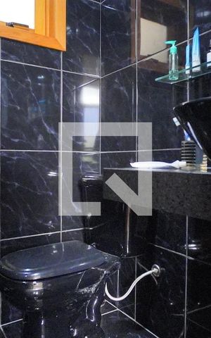 Casa à venda com 350m², 4 quartos e 4 vagasBanheiro Quarto