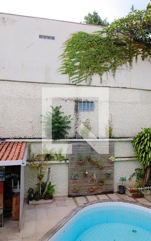 Casa à venda com 400m², 5 quartos e 2 vagas Casa à venda com 400m², 5 quartos e 2 vagasVista da Suíte 1