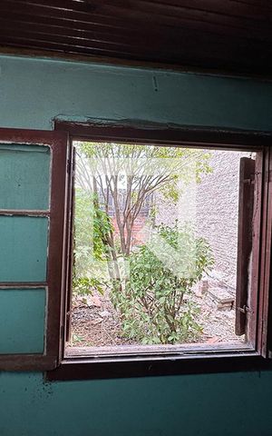 Casa à venda com 120m², 2 quartos e 1 vagaJanela da Cozinha 2