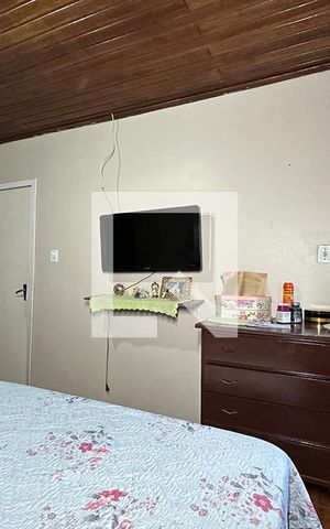 Casa à venda com 243m², 5 quartos e 2 vagasQuarto 1 - Suíte