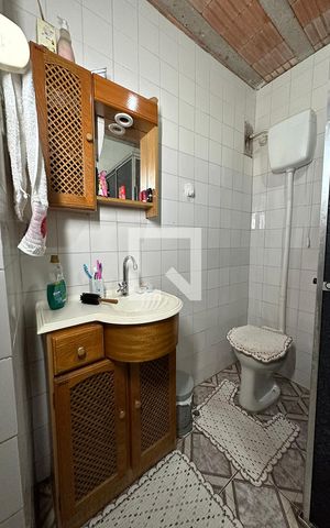 Casa à venda com 243m², 5 quartos e 2 vagasBanheiro 2
