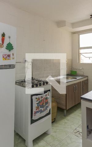 Apartamento à venda com 40m², 2 quartos e 1 vaga Apartamento à venda com 40m², 2 quartos e 1 vagaCozinha e Área de Serviço